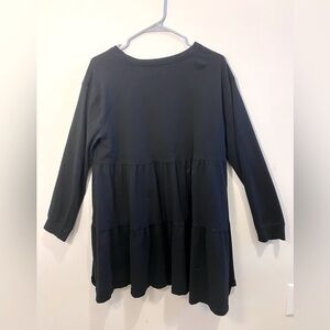 Women’s simple black dress, with ruffles